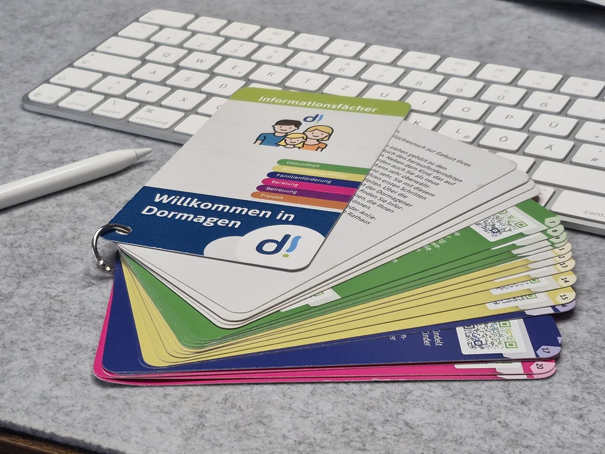 Informationsfächer für Familien, gestaltet für die Stadt Dormagen